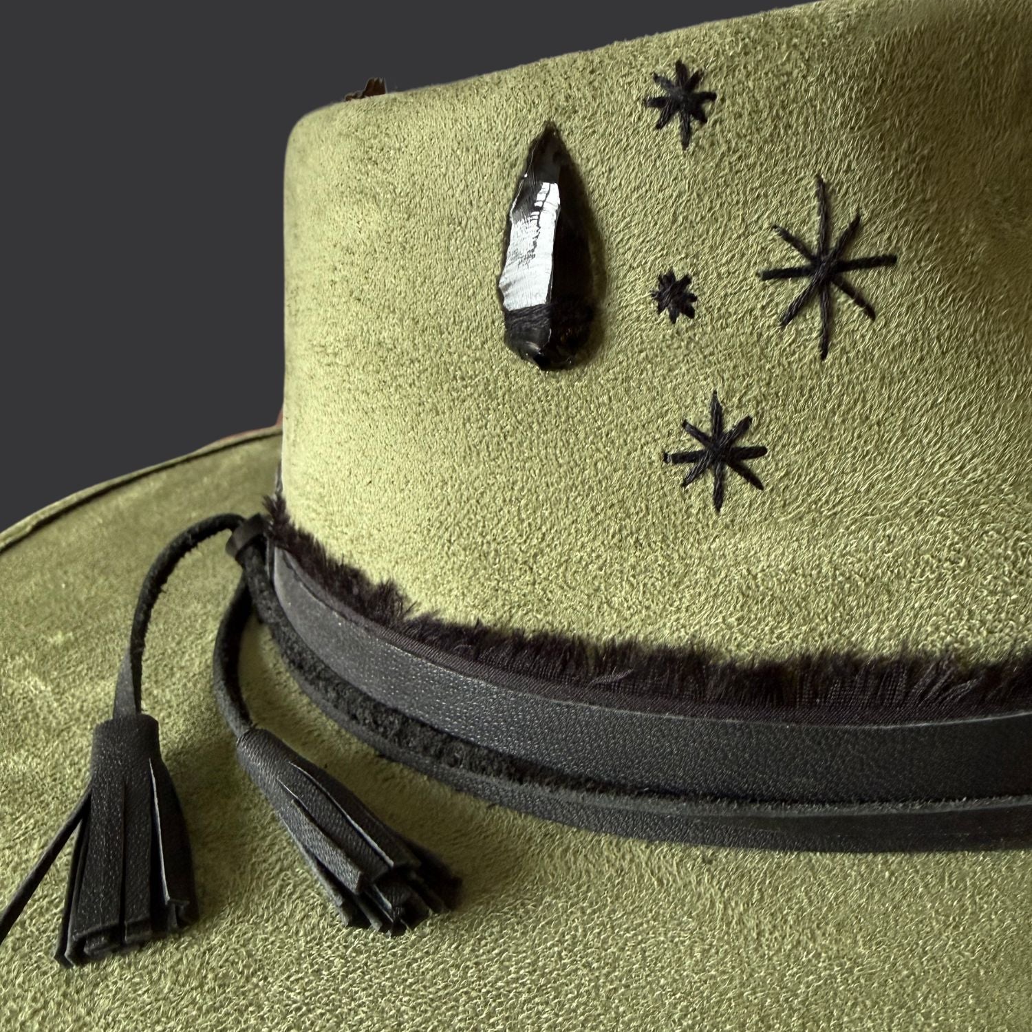 sage green boho fedora hat with arrow embroidery and obsidian arrow / close up