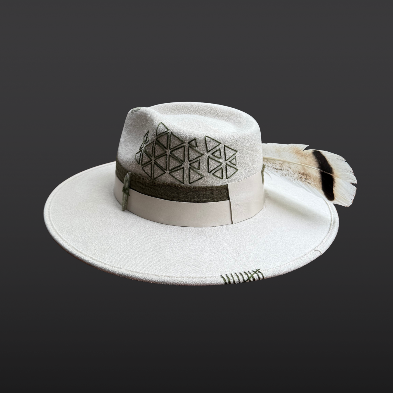 Angled back side view of Delta Fedora Hat showcasing an embroidered sacred geometry triangle pattern on an ivory wide brim fedora.