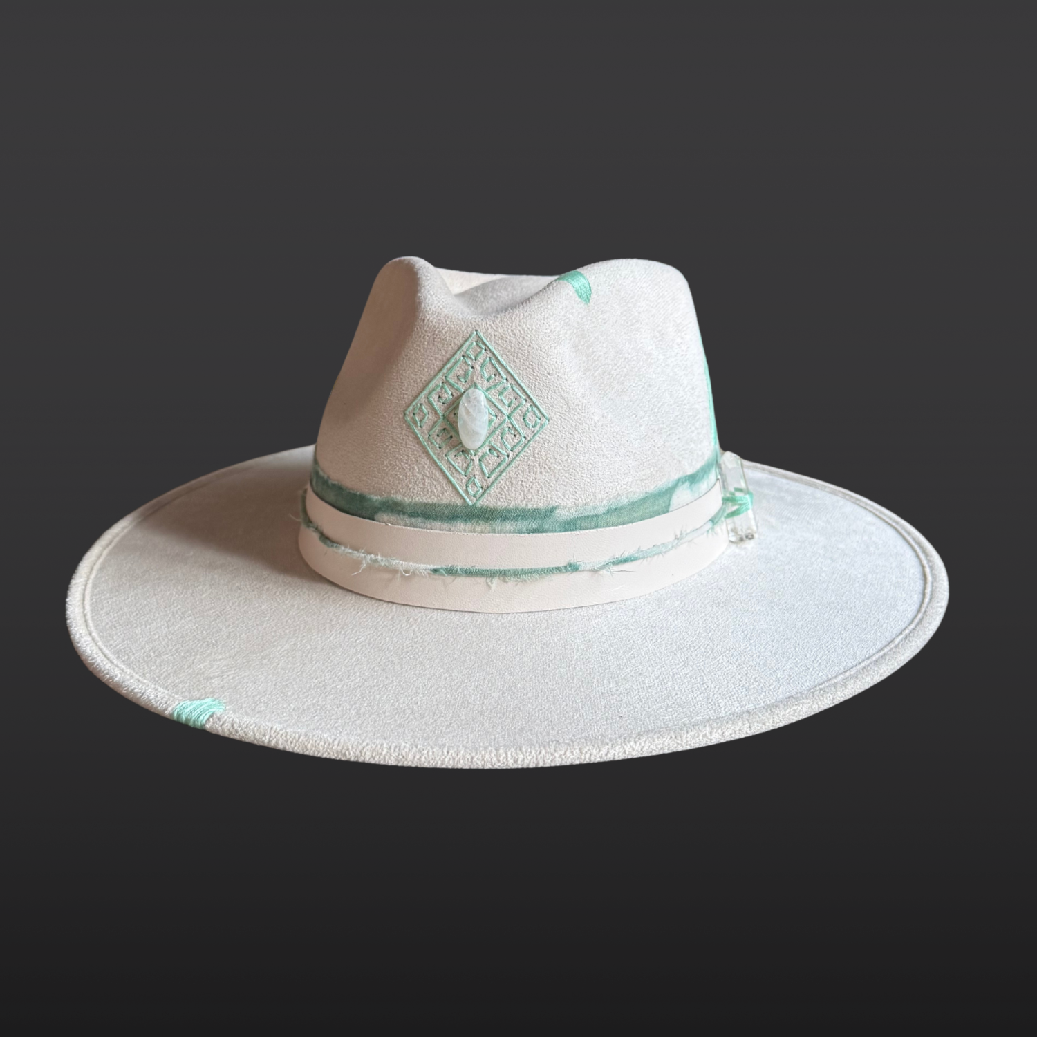 Front view of ivory wide brim fedora featuring a hand-embroidered diamond design with genuine Moonstone