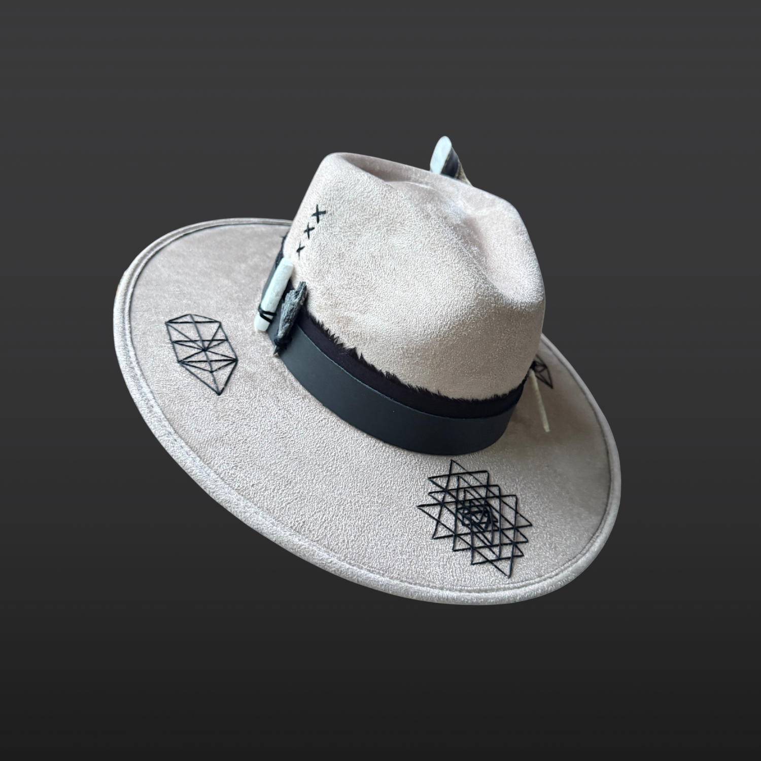 Rooted Light fedora hat in khaki featuring hand embroidered Sri Yantra symbols, Tree of Life embroidery, black kyanite, selenite, leather band and turkey feather.