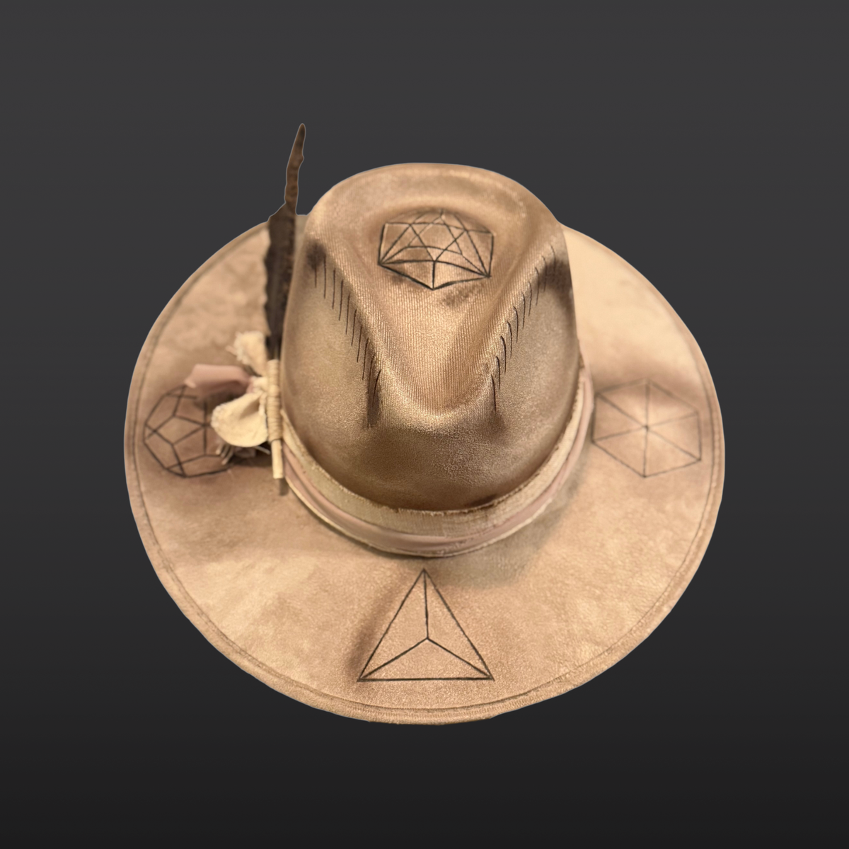 Top view of Harmonia wide brim fedora hat featuring hand-burned sacred geometry and turkey feather