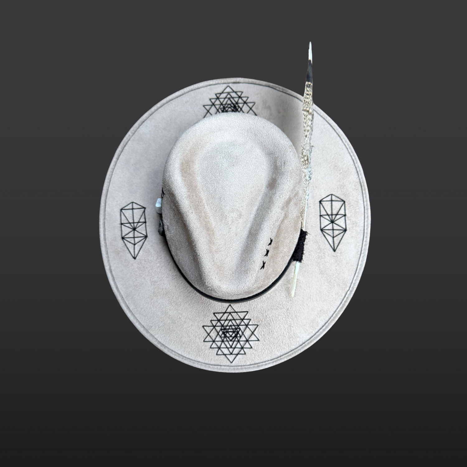 Top view of Rooted Light fedora highlighting khaki crown, black band details and handcrafted design.