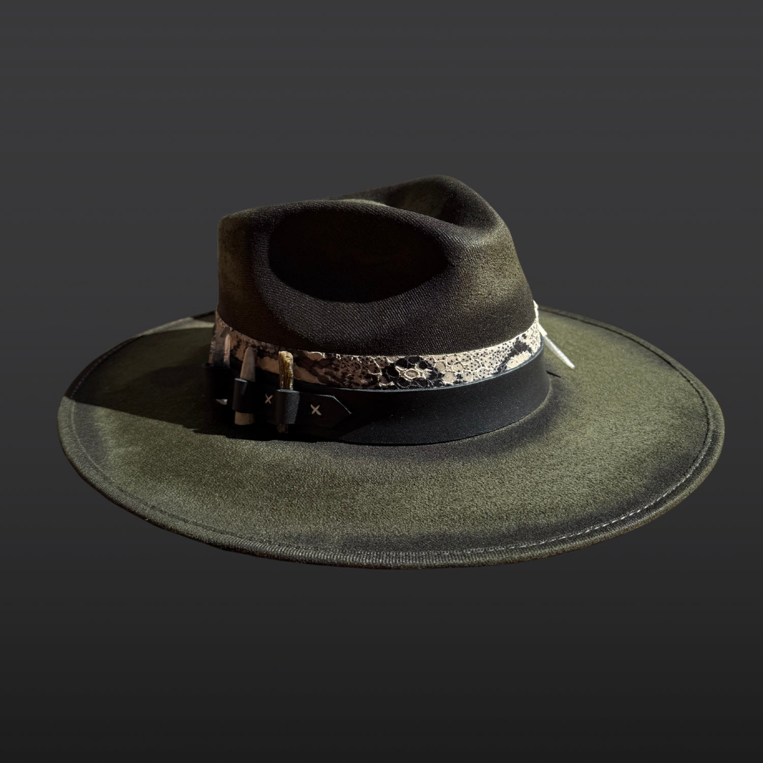Left side view of the Verdant Viper fedora showcasing layered black and serpent-print leather bands with green kyanite, Lemurian quartz, and deer antler details.