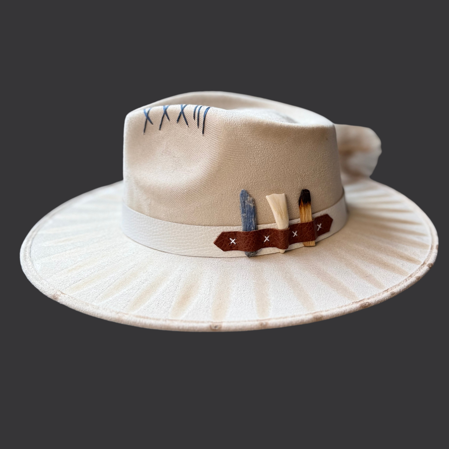 Ivory fedora boho hat with bison tooth, blue kyanite, and palo santo/ right view