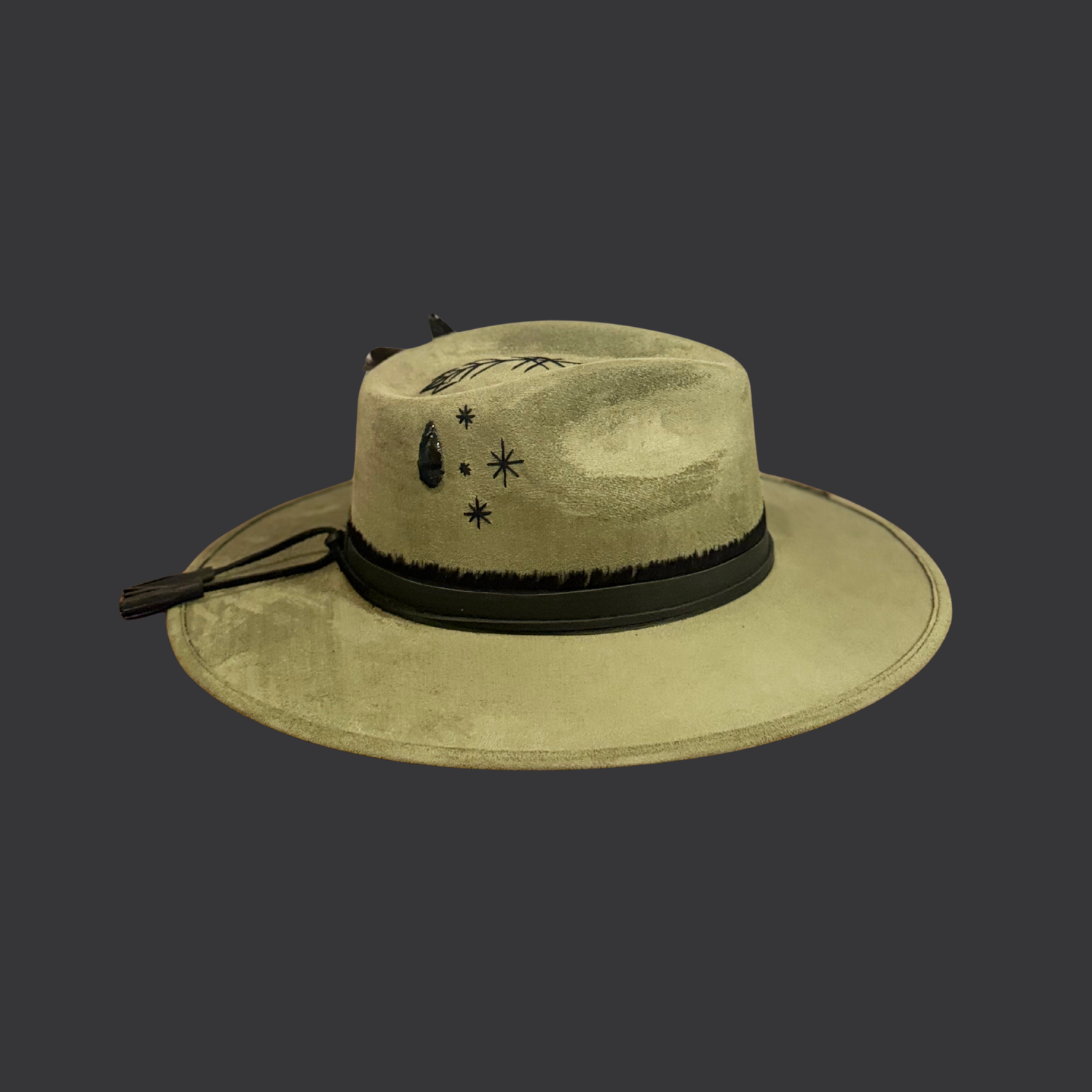 sage green boho fedora hat with arrow embroidery and obsidian arrow / left view