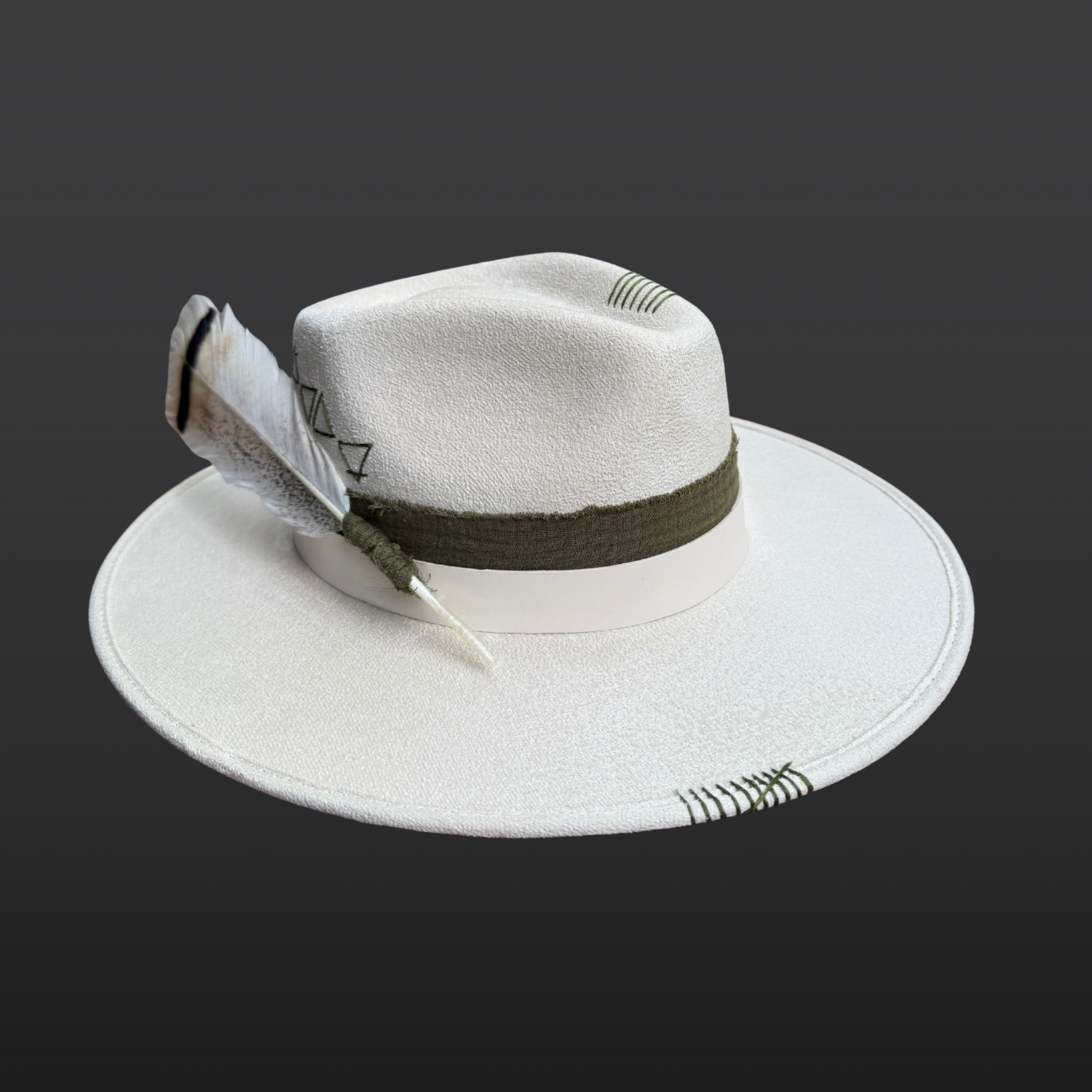 Angled left side view of Delta Fedora Hat showcasing an embroidered sacred geometry triangle pattern on an ivory wide brim fedora.