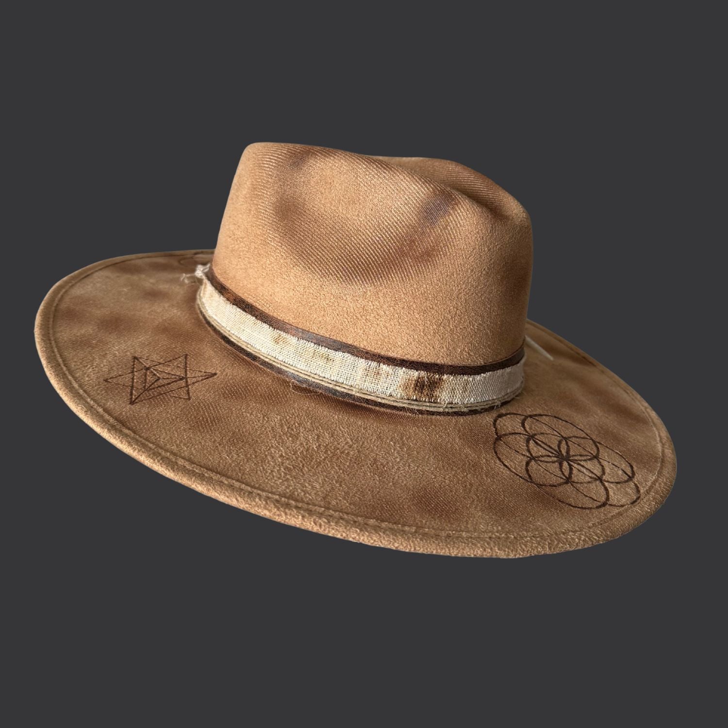 Camel boho fedora hat with hand burned Seed of Life design, agate crystal detail, and dark brown leather band / left side view