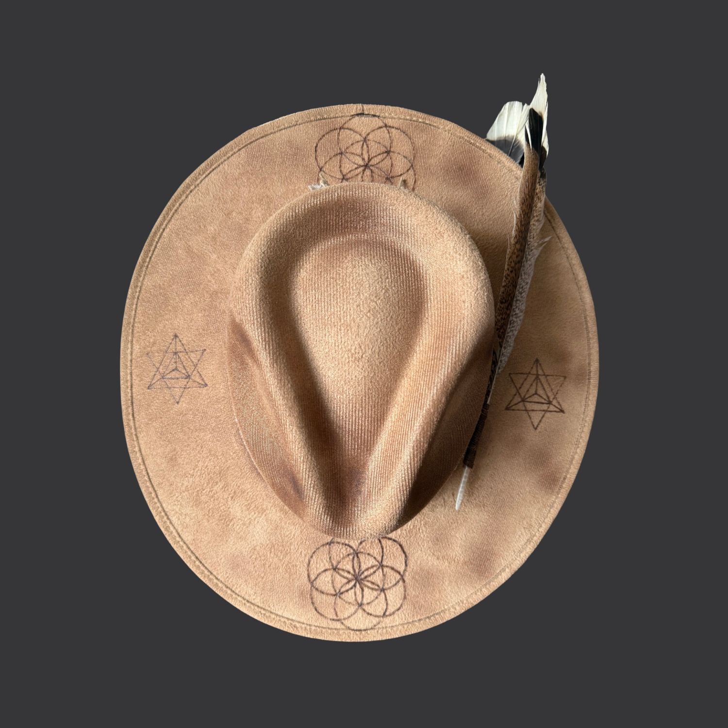 Camel boho fedora hat with hand burned Seed of Life design, agate crystal detail, and dark brown leather band/ top view