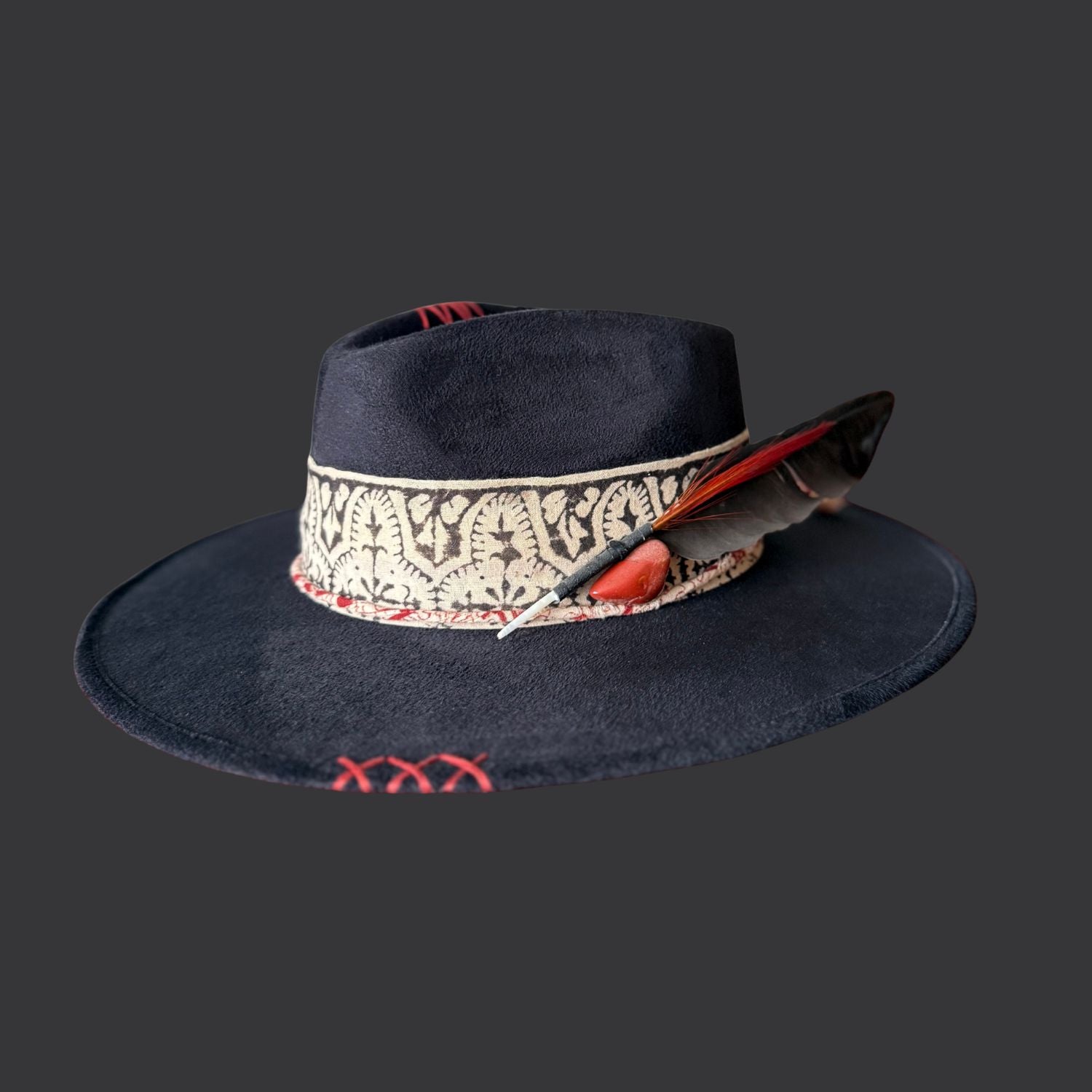 Right view of one of a kind black fedora hat with red jasper, embroidered details, and feather accents