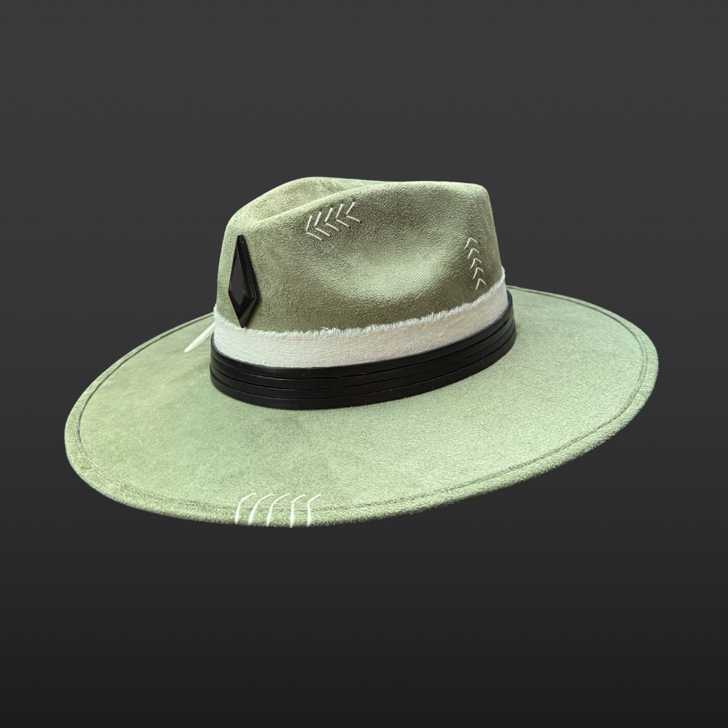 One of a kind sage green artisan fedora hat with obsidian stone, black leather band, white cotton wrap, feather detail, and hand embroidered directional symbols right view by Inara Hat Co.