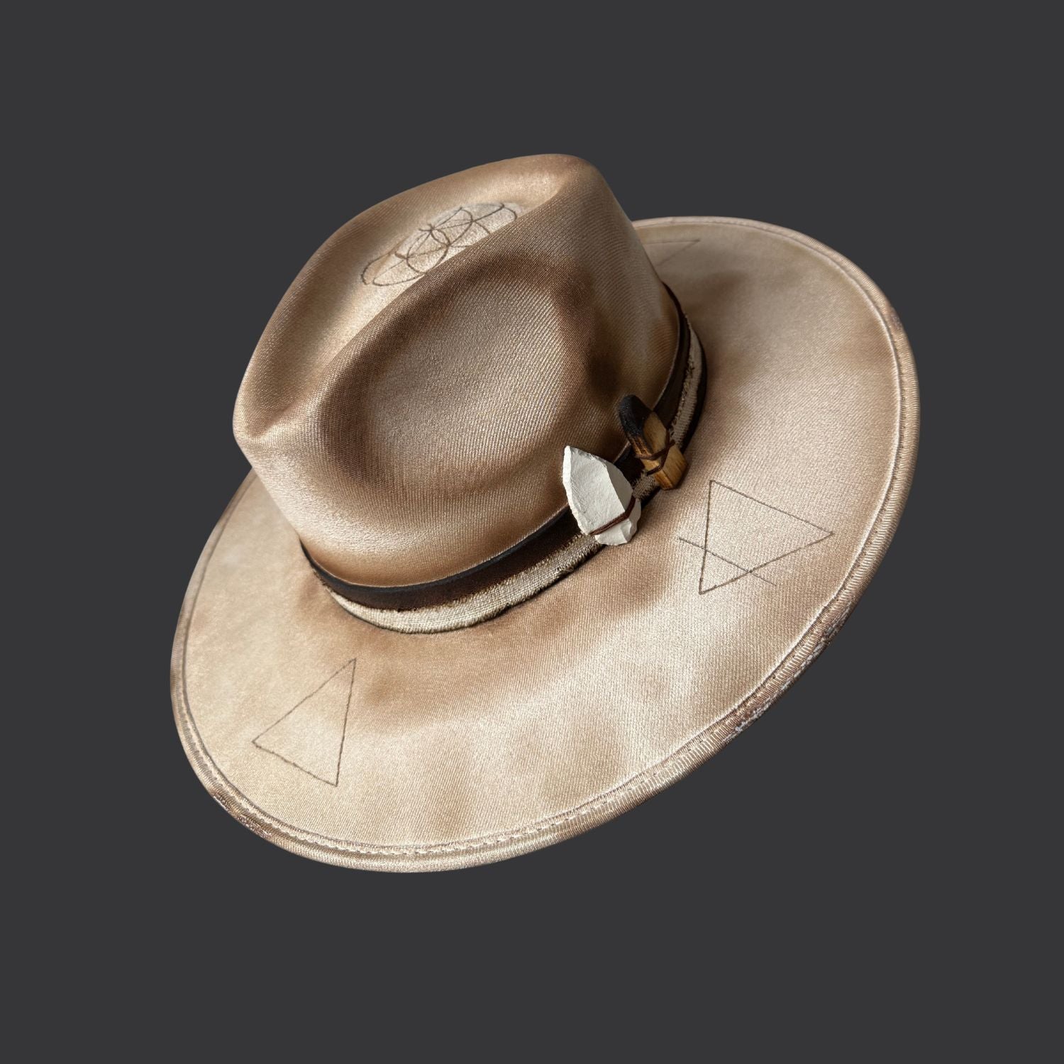 Cream wide-brim vegan suede fedora with Seed of Life and Four Elements pyrography, brown leather band, feather, and crystal arrow / right side view