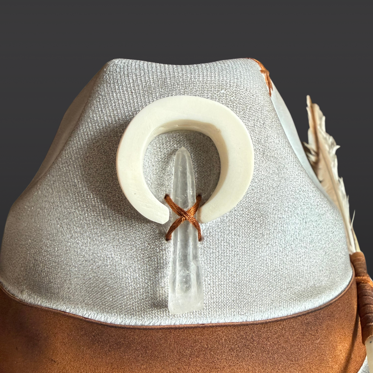Close-up of genuine Lemurian Quartz set within a naturally shed deer antler on the Wayfinder fedora
