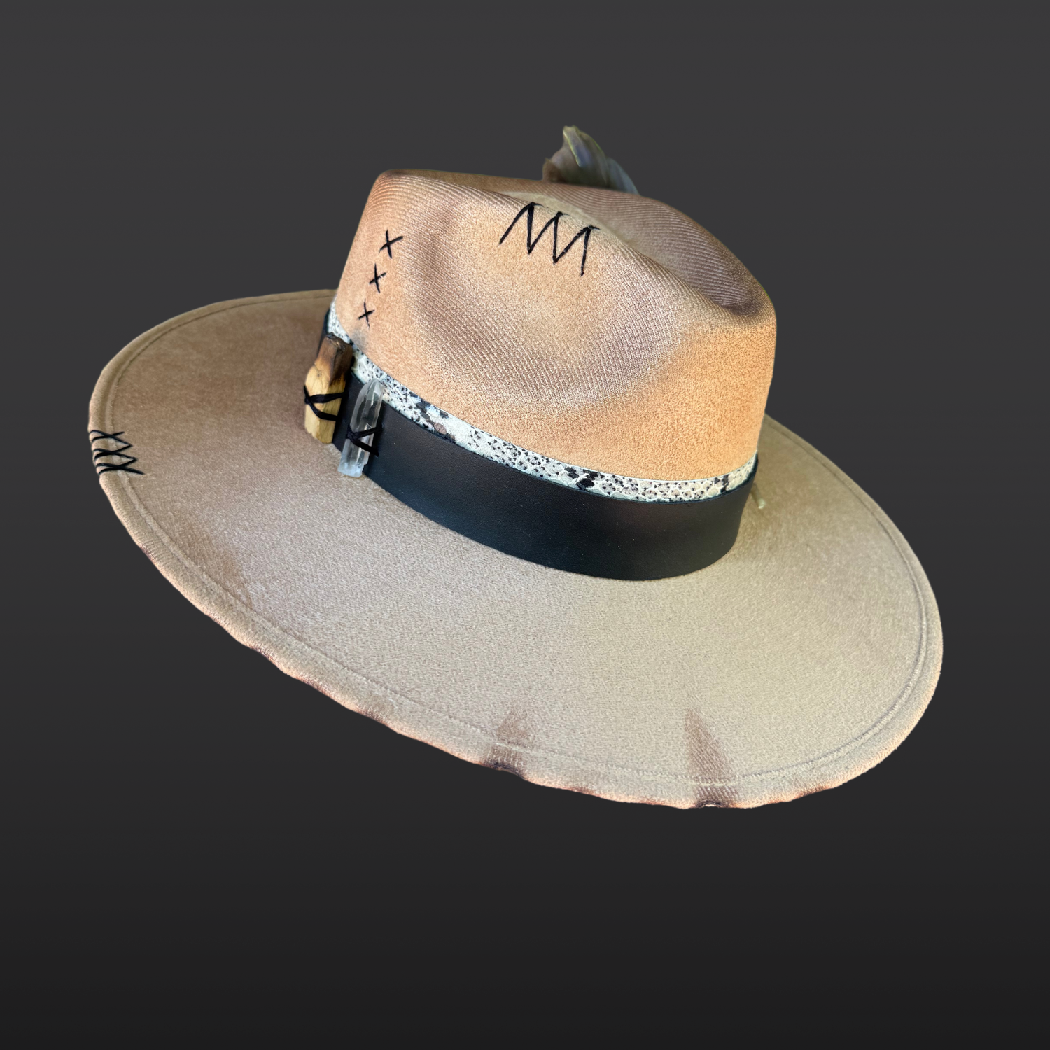 Camel wide brim fedora with black leather band, serpent print leather accent, turkey feather, and side-mounted clear quartz crystal by Inara Hat Co.