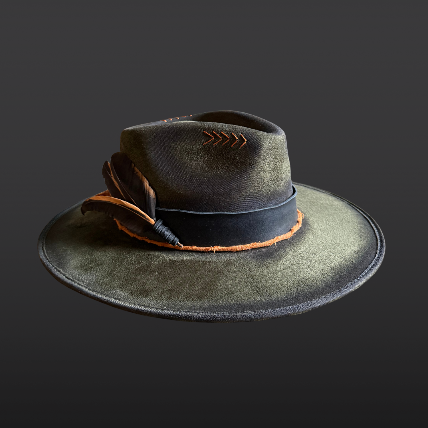 Left Side profile of the Solar Path Fedora Hat showing tangerine quartz double point crystal, black and orange rooster feathers, and leather band details.