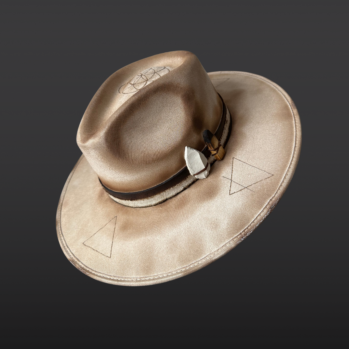 Front view of Elemental Harmony one-of-a-kind cream wide-brim fedora with Seed of Life and Four Elements pyrography