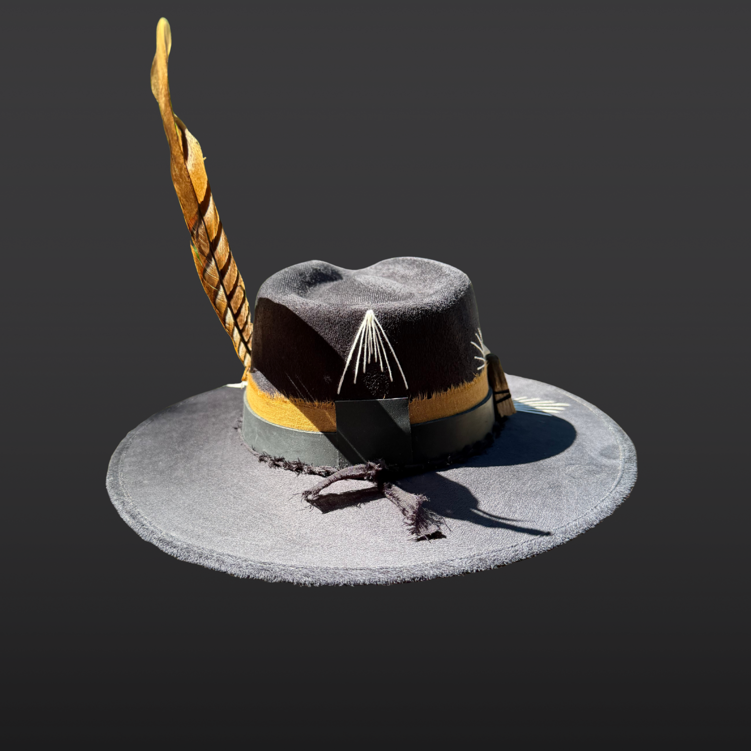 Back view of Wild & Free black fedora featuring hand embroidered white sunburst accents and layered crown bands.