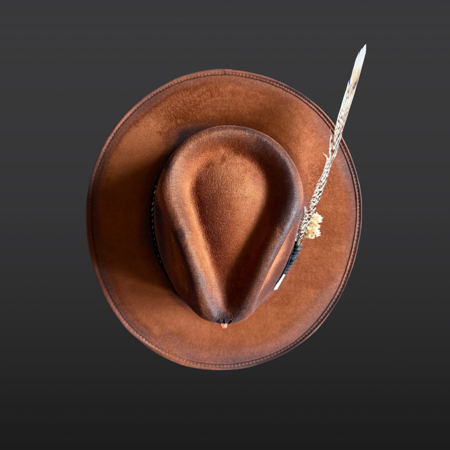 Top view of Wild in the Woods fedora hat showing hand-embroidered tall pine trees on tobacco vegan suede