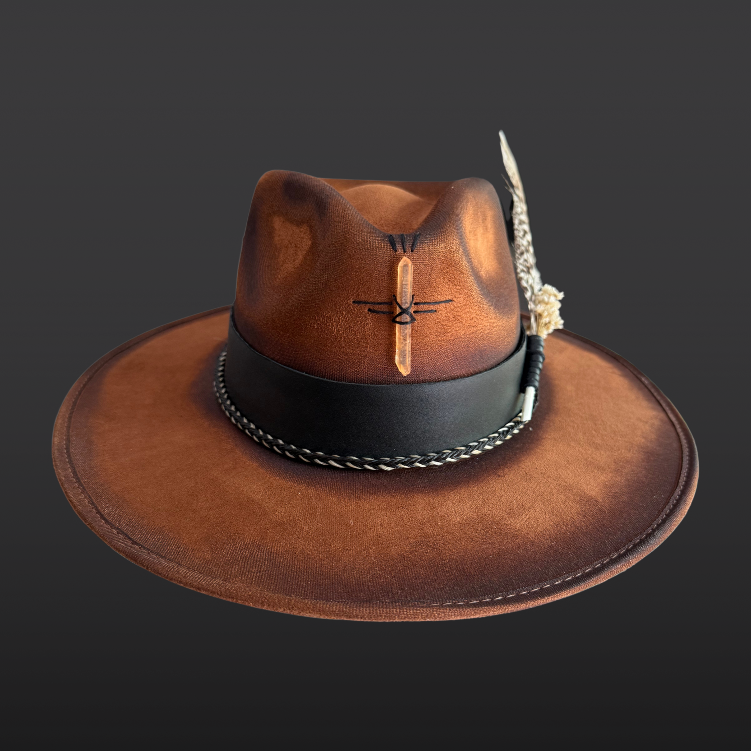 Front view of Wild in the Woods fedora hat showing hand-embroidered tall pine trees on tobacco vegan suede