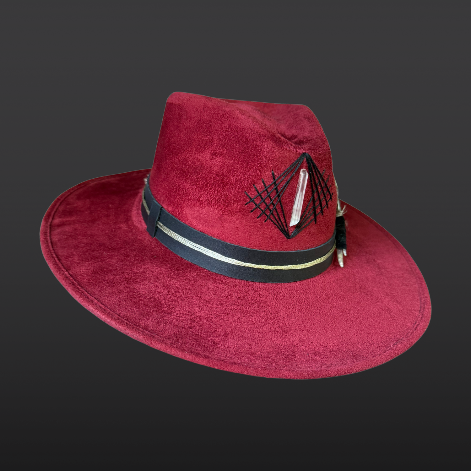 Red statement fedora hat with hand-embroidered details and a wide brim designed for festival and bohemian style.