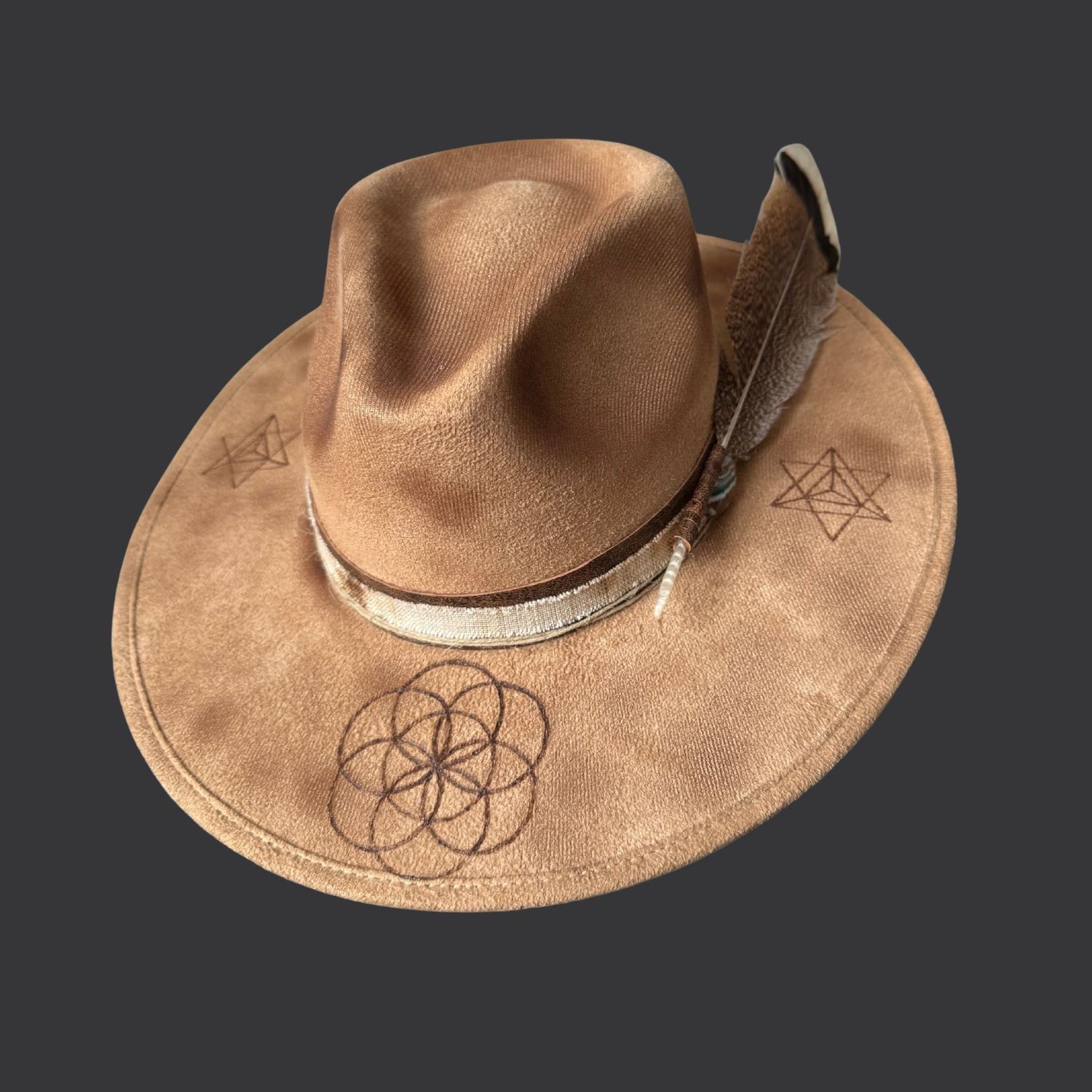 Camel boho fedora hat with hand burned Seed of Life design, agate crystal detail, and dark brown leather band / front view