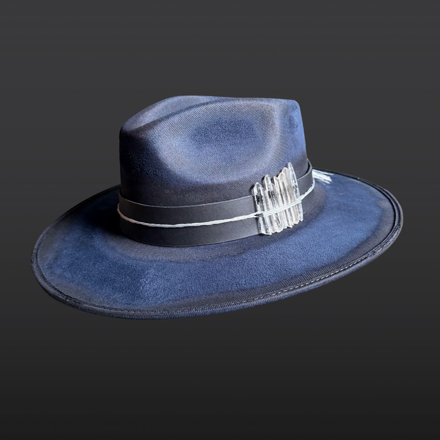 Celestial Alignment Fedora Hat in navy vegan suede featuring quartz crystals, silver embroidery, black leather band, and celestial-inspired details.