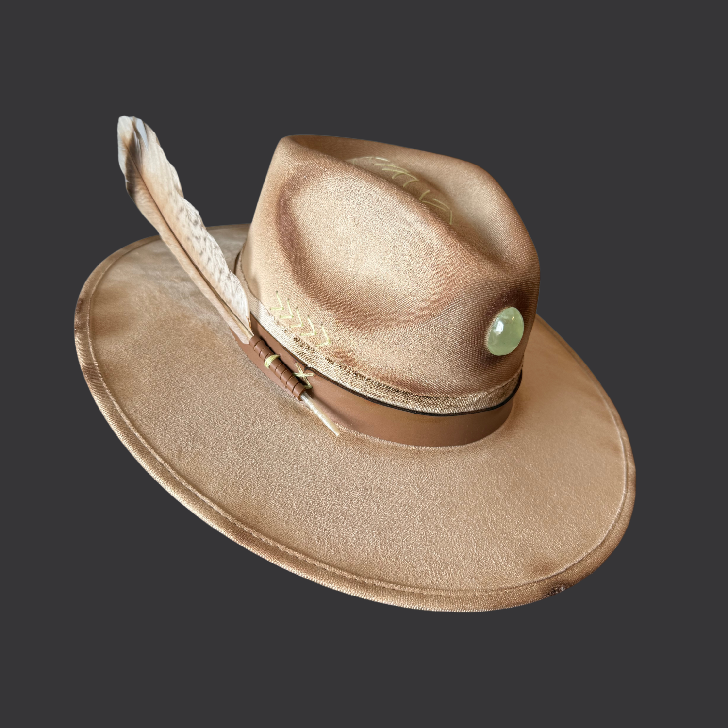 Left side view of cream wide-brim hat showing hand-torched texture and embroidered “M B S” on crown
