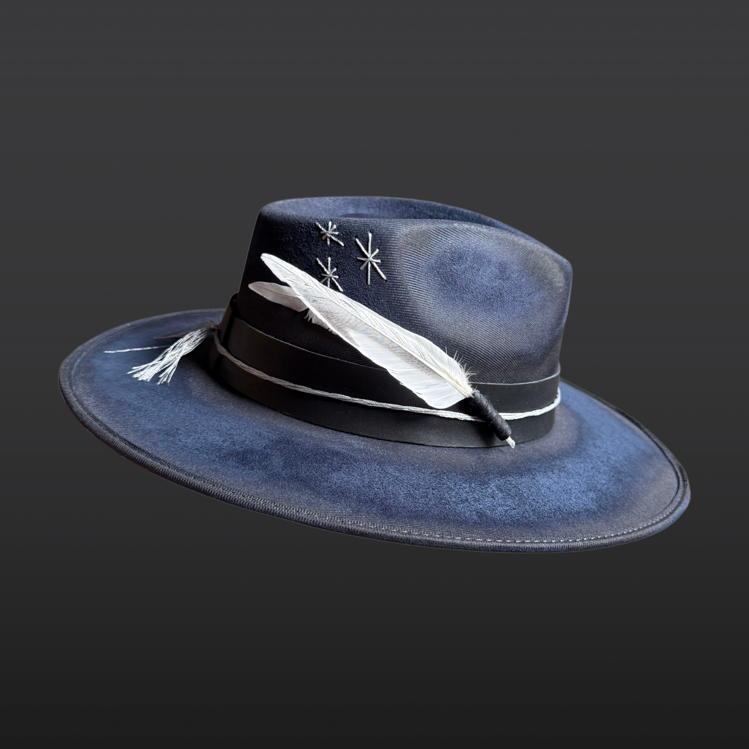 Left Side profile of the Celestial Alignment Fedora Hat showing eight quartz crystal points, silver accents, and white and silver feather details.